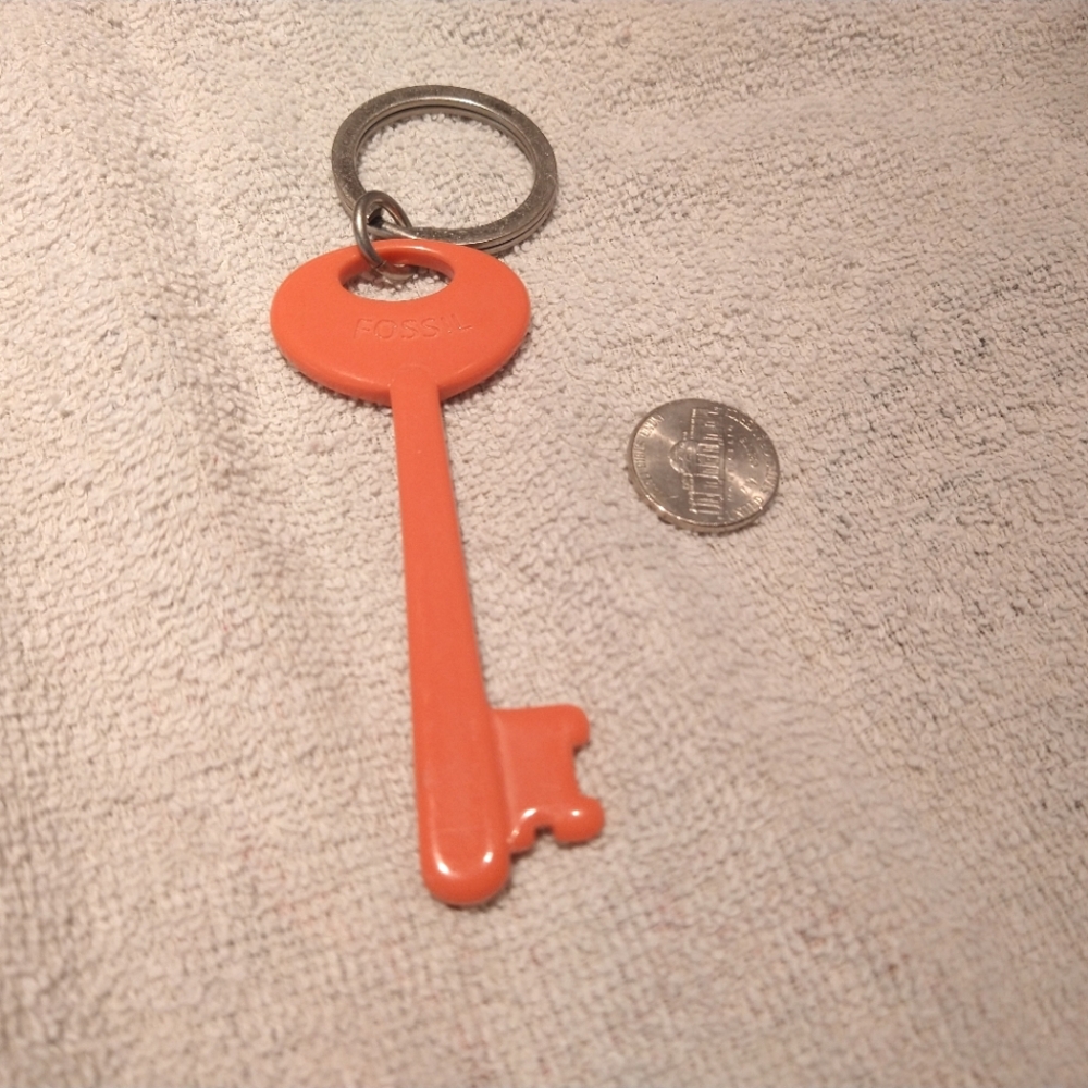 Fossil Orange Key Shaped Plastic Keychain Bag Purse Charm